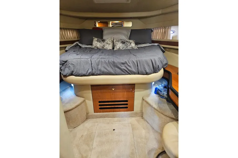 Slide: The Image of Luxurious cabin interior of 2000 Sea Ray Sundancer 460 yacht with cozy bedding. - 8