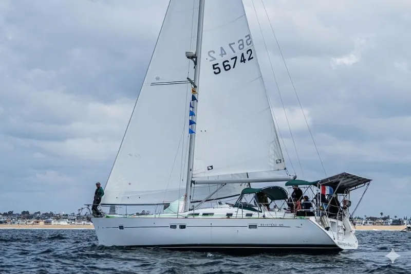 The Image of Sailing yacht Beneteau 423, 2007 model, cruising on open water under cloudy skies. - 0