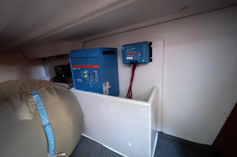 Slide: The Image of Electrical system inside a 2007 Beneteau 423 yacht, featuring a Victron Energy setup. - 36