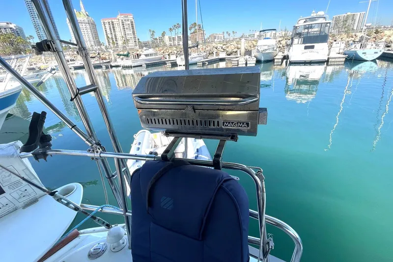 Slide: The Image of Beneteau 423 sailboat with Magma grill, docked in a marina, 2007 model. - 47