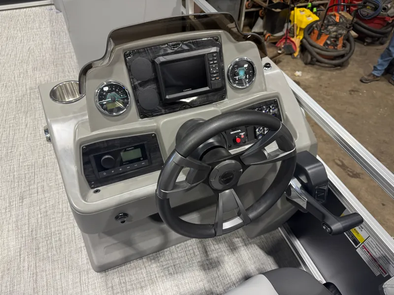 Slide: The Image of 2026 Tahoe Sport 2385 Tritoon helm with Honda 4-Stroke EFI controls. - 12