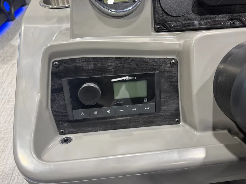 Slide: The Image of Dashboard of Tahoe Sport 2385 Tritoon with Fusion Bluetooth control. - 13