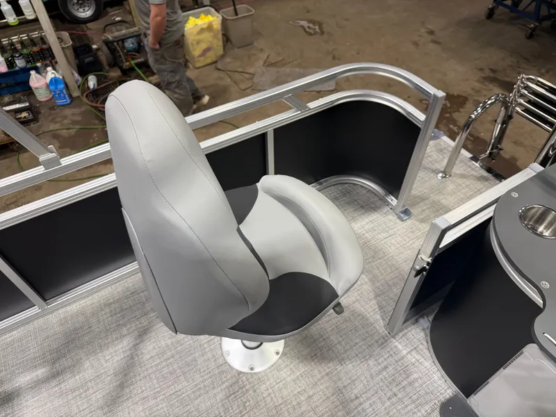 Slide: The Image of Interior of Tahoe Sport 2385 Tritoon with gray seat, 2026 model. - 22