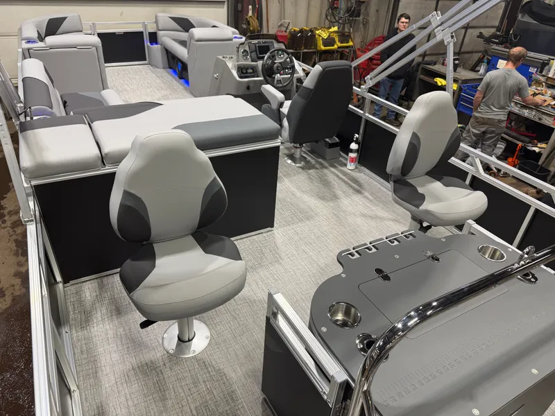 Slide: The Image of Interior of 2026 Tahoe Sport 2385 Tritoon with modern seating. - 23