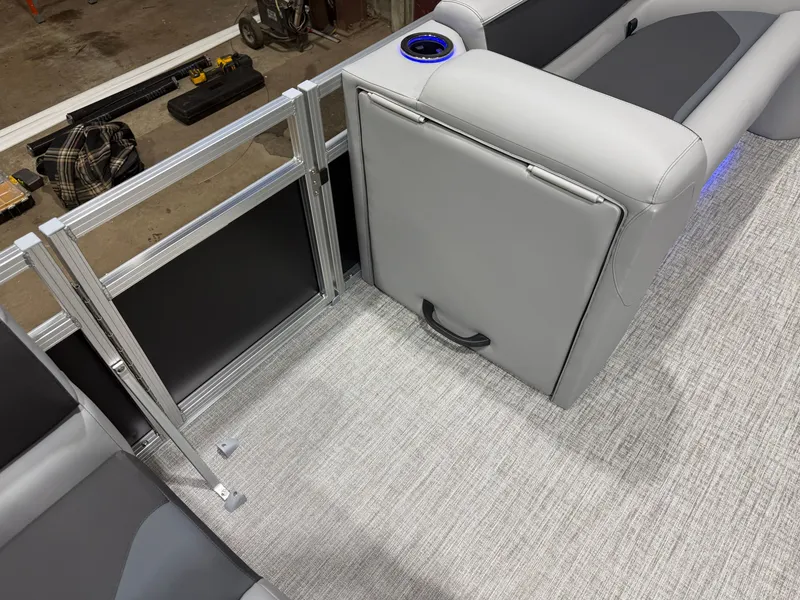 Slide: The Image of Interior of Tahoe Sport 2385 Tritoon with gray seating, 2026 model. - 28