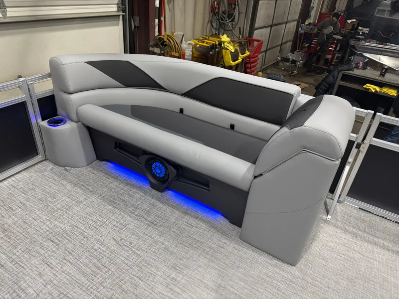 Slide: The Image of 2026 Tahoe Sport 2385 Tritoon seating with blue LED lighting. - 31