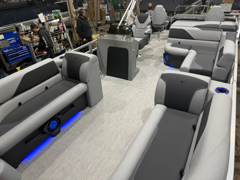 Slide: The Image of Interior of 2026 Tahoe Sport 2385 Tritoon with gray seating. - 33
