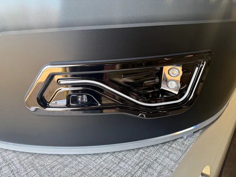 Slide: The Image of Close-up of 2026 Tahoe Sport 2385 Tritoon light. - 36