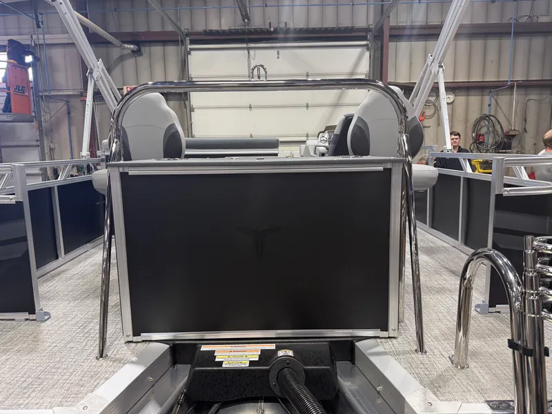 Slide: The Image of 2026 Tahoe Sport 2385 Tritoon inside a workshop. - 43