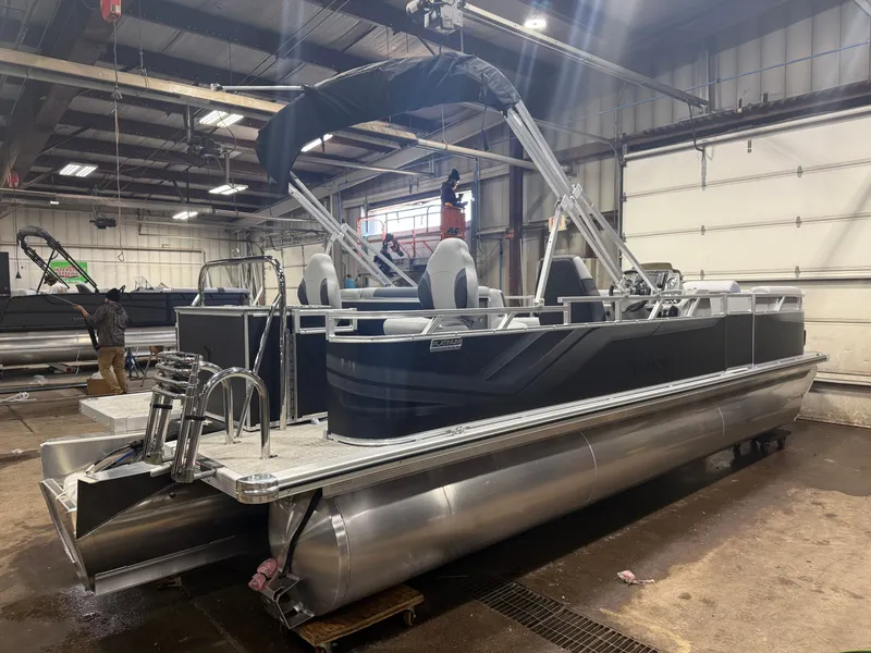 Slide: The Image of 2026 Tahoe Sport 2385 Tritoon indoors, ready for use. - 46