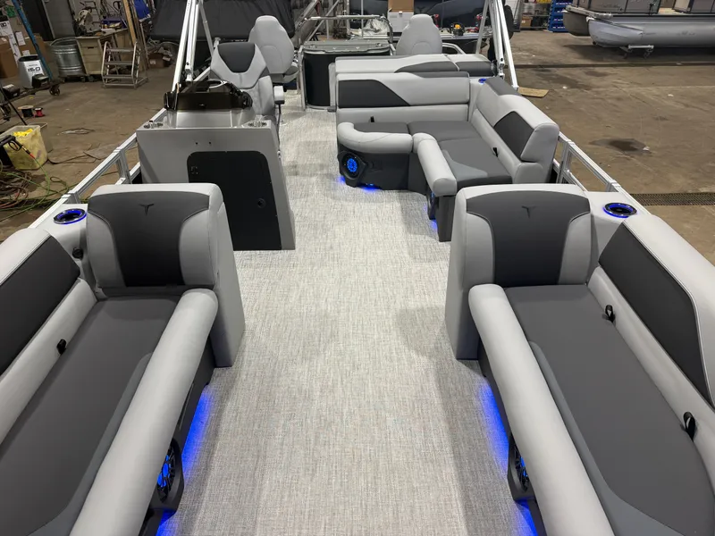 Slide: The Image of Interior of 2026 Tahoe Sport 2385 Tritoon with gray seating. - 6
