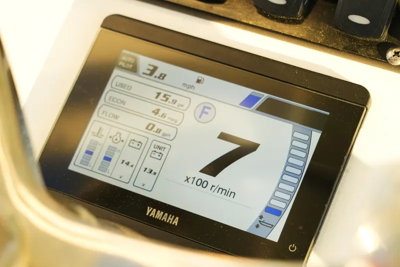 Slide: The Image of Yamaha display on 2022 Sea Hunt Ultra 229 showing speed, fuel, and RPM data. - 4