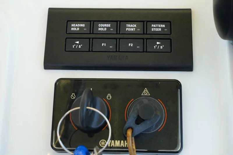 Slide: The Image of Control panel of a 2022 Sea Hunt Ultra 229 boat with Yamaha controls. - 7