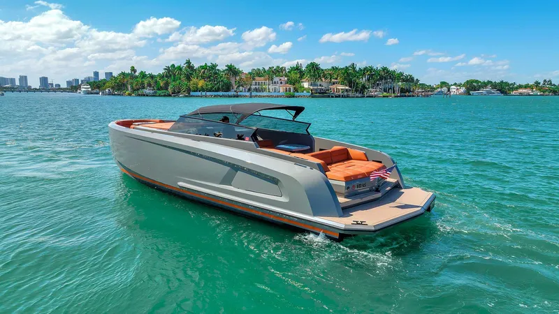 Slide: The Image of Vanquish Yachts VQ 45, 2021 model, cruising on clear blue waters under a sunny sky. - 13