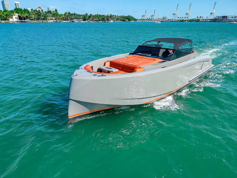 Slide: The Image of Vanquish Yachts VQ 45, 2021 model, cruising on turquoise waters. - 17
