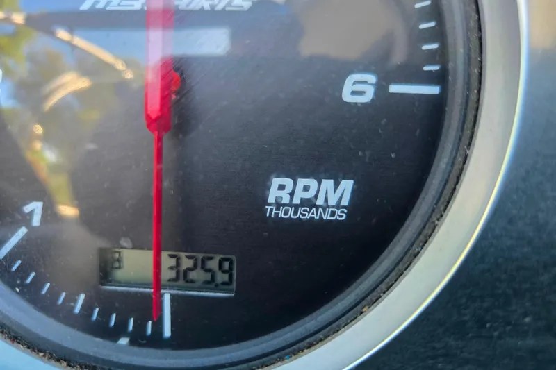 Slide: The Image of Close-up of 2010 MB SPORTS 21 Tomcat tachometer showing 3259 RPM. - 18
