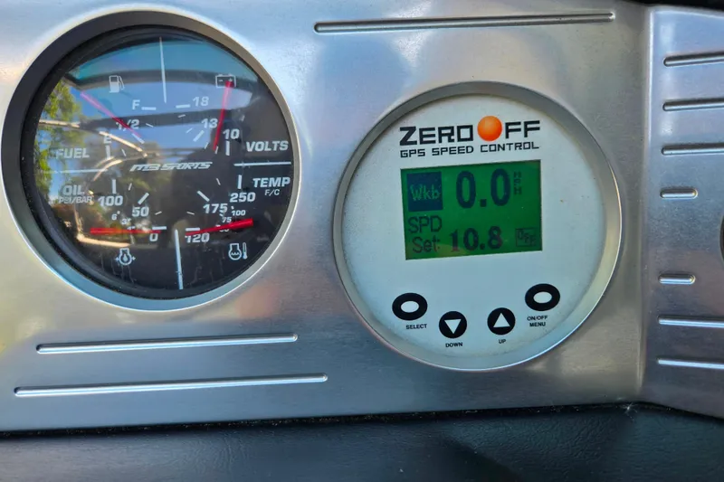 Slide: The Image of Dashboard of 2010 MB SPORTS 21 Tomcat with gauges and GPS speed control display. - 19