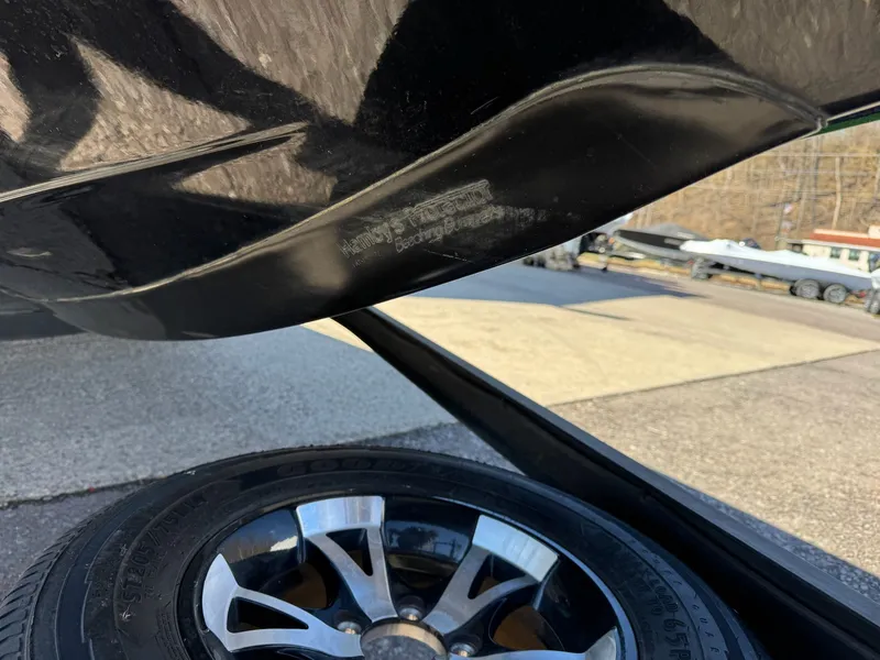 Slide: The Image of Close-up of a 2019 Skeeter ZX225 boat with wheel view. - 12
