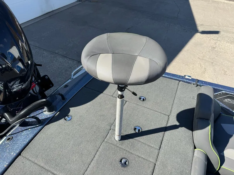 Slide: The Image of 2019 Skeeter ZX225 boat with gray seat on deck. - 13