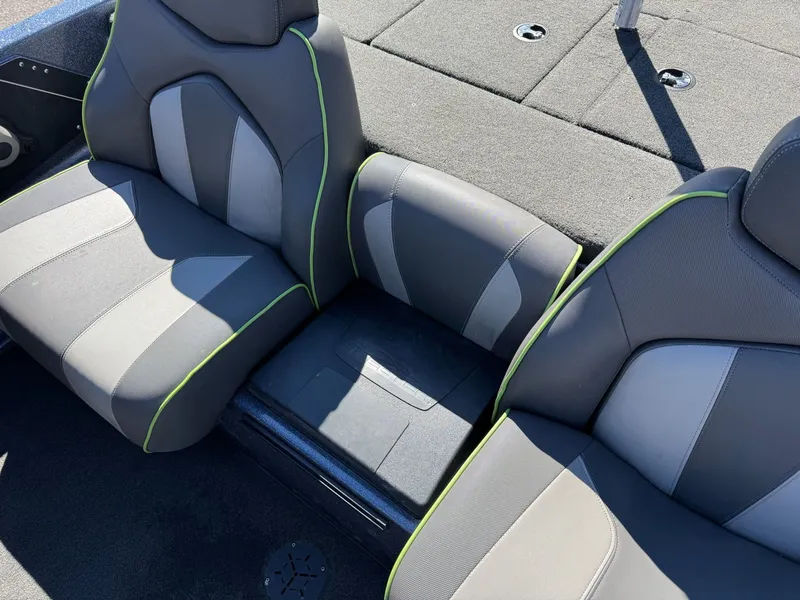Slide: The Image of Skeeter ZX225 2019 boat seats with gray and green design. - 15