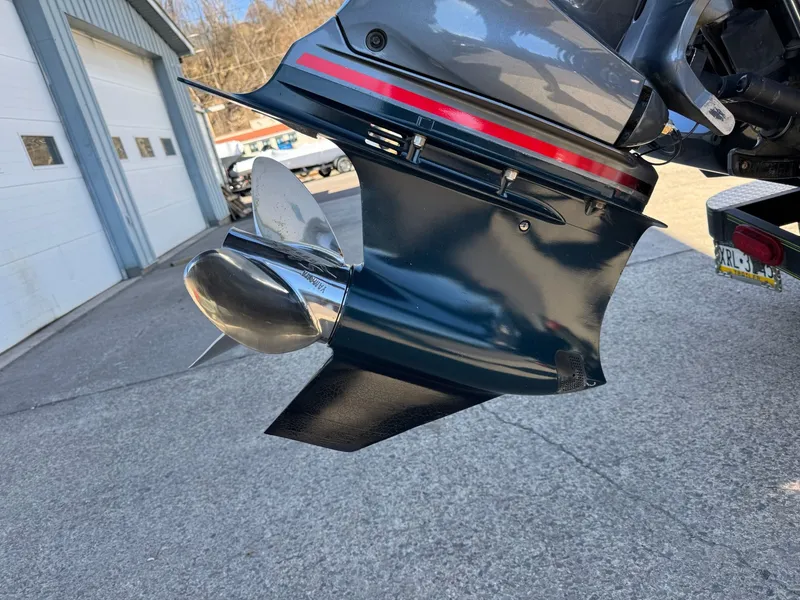 Slide: The Image of 2019 Skeeter ZX225 boat motor with shiny propeller. - 31