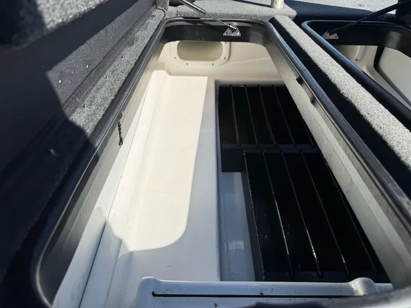 Slide: The Image of Interior view of storage compartment in 2019 Skeeter ZX225 boat. - 5