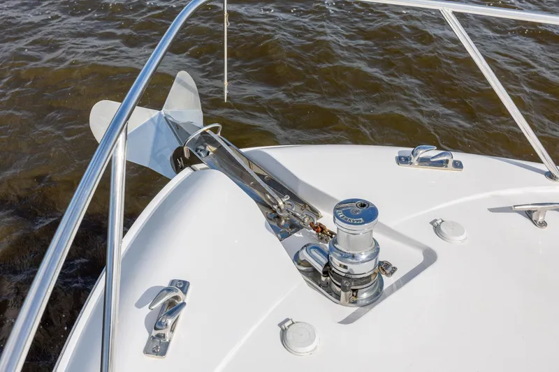 Slide: The Image of Bow of 2008 Hatteras 64 Motor Yacht with anchor and winch system. - 103