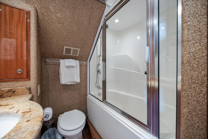Slide: The Image of Luxurious bathroom in 2008 Hatteras 64 Motor Yacht with shower and elegant finishes. - 77