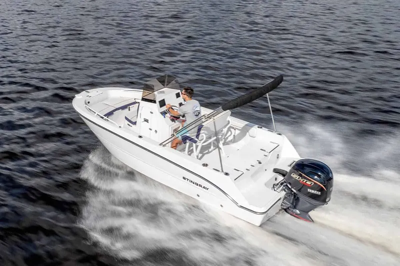Slide: The Image of 2026 Stingray 173 CC boat cruising on water. - 12