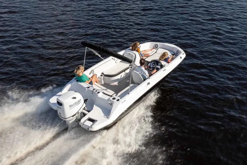 Slide: The Image of Stingray 182 SC 2026 boat cruising on water with passengers. - 11