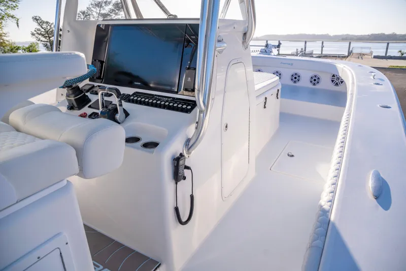 Slide: The Image of Modern Freeman 33 boat cockpit with advanced controls and seating, 2011 model. - 13