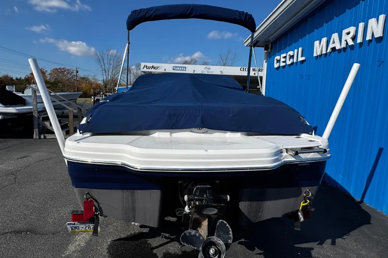 Slide: The Image of 2015 Chaparral 19 H2O Sport boat with blue cover at Cecil Marine. - 10