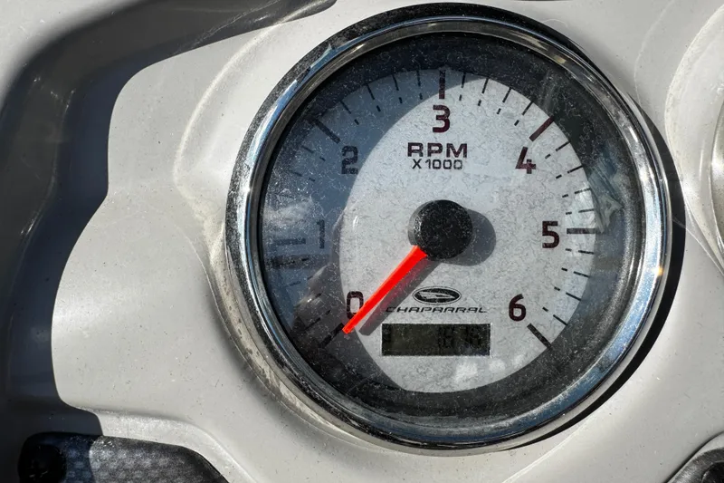 Slide: The Image of Close-up of a 2015 Chaparral 19 H2O Sport tachometer showing RPM gauge. - 21