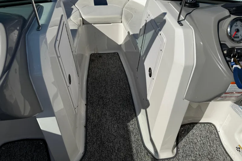 Slide: The Image of Interior view of 2015 Chaparral 19 H2O Sport boat with carpeted flooring. - 34