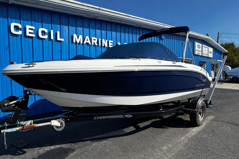 Slide: The Image of 2015 Chaparral 19 H2O Sport boat on trailer at Cecil Marine dealership. - 9