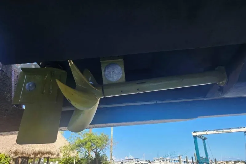 Slide: The Image of Underwater view of a 2000 SeaVee 290B boat propeller and rudder system. - 9