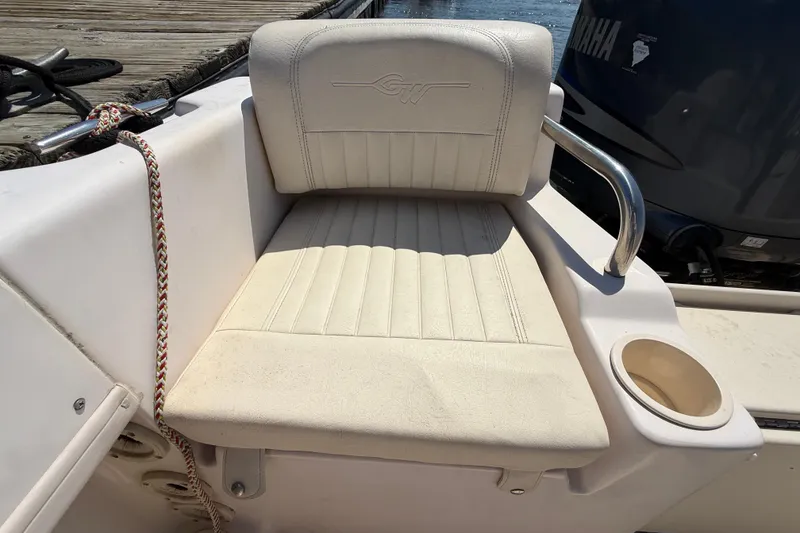 Slide: The Image of 2011 Grady-White Fisherman 209 boat seat with cup holder and Yamaha engine. - 31