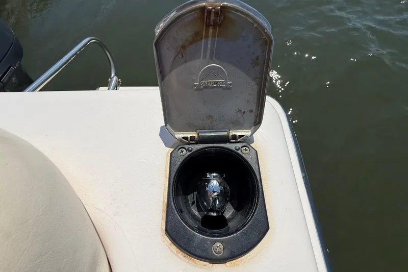 Slide: The Image of Open hatch on 2011 Grady-White Fisherman 209 boat, revealing a Sandvik fitting. - 37