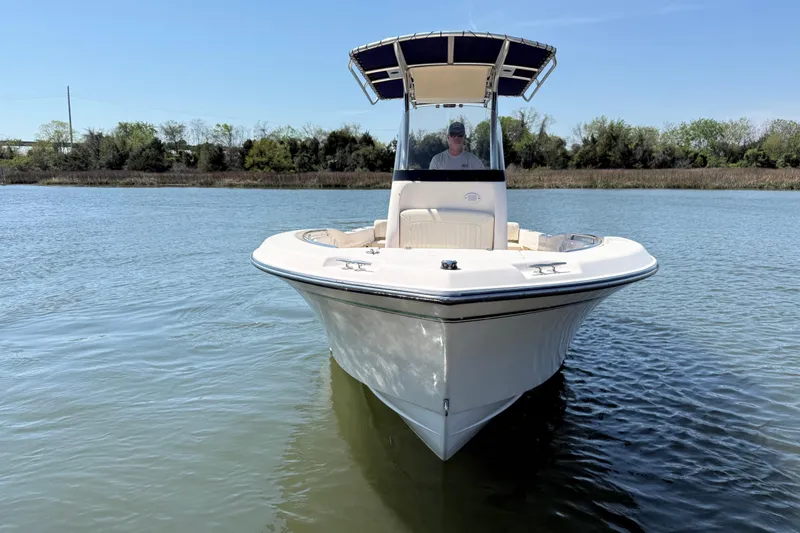 Slide: The Image of 2011 Grady-White Fisherman 209 boat on calm water, front view. - 4