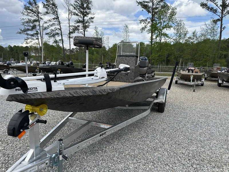 Slide: The Image of Xpress Hyper-Lift Bay Series H210B boat on trailer, 2026 model. - 3