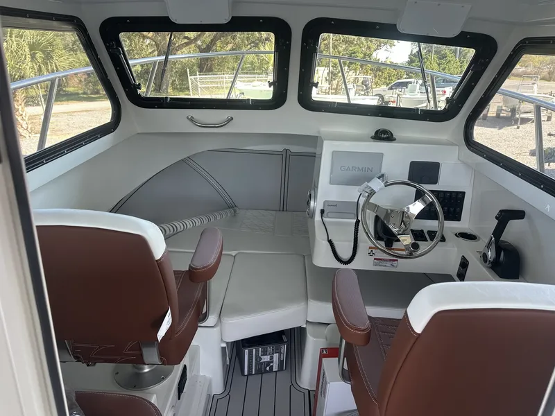 Slide: The Image of Interior of 2026 Parker 227 Explorer with modern helm. - 10