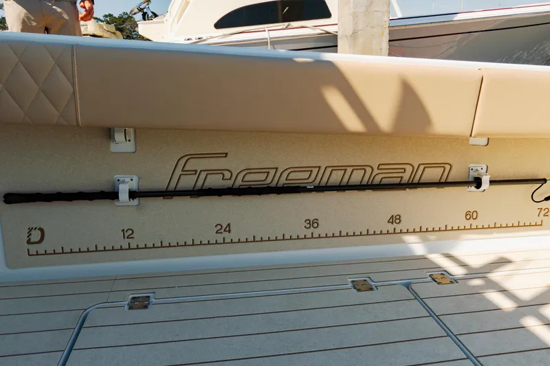 Slide: The Image of Freeman 38 boat interior with measurement markings, 2025 model. - 38
