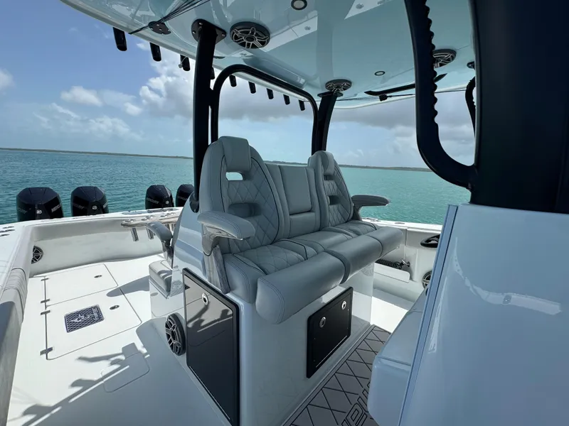 Slide: The Image of Luxury interior of 2025 Freeman 38 boat with plush seating and ocean view. - 15