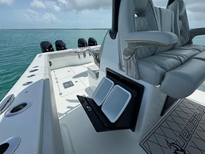 Slide: The Image of Luxury Freeman 38 boat interior with plush seating, ocean view, and modern design, 2025 model. - 34