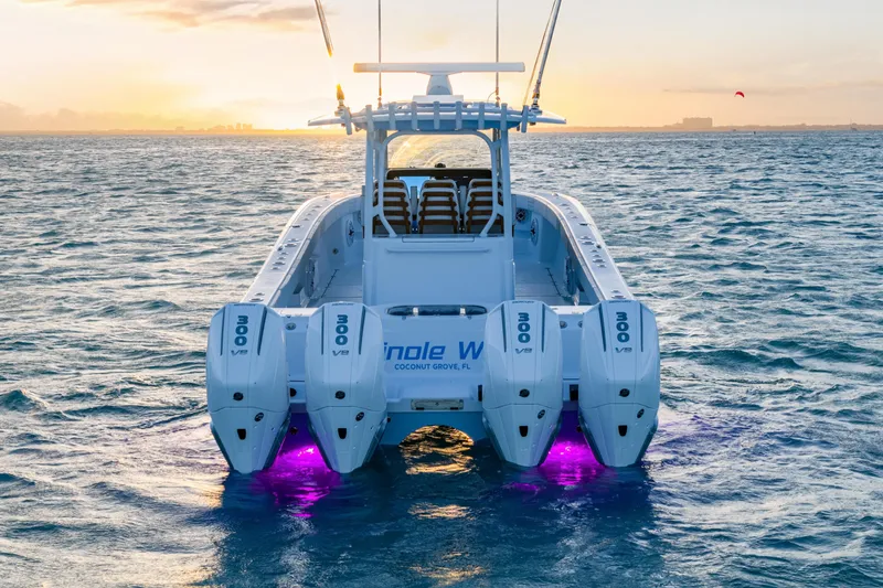 Slide: The Image of Freeman 38 boat with quad engines at sunset, 2026 model, ocean view. - 43