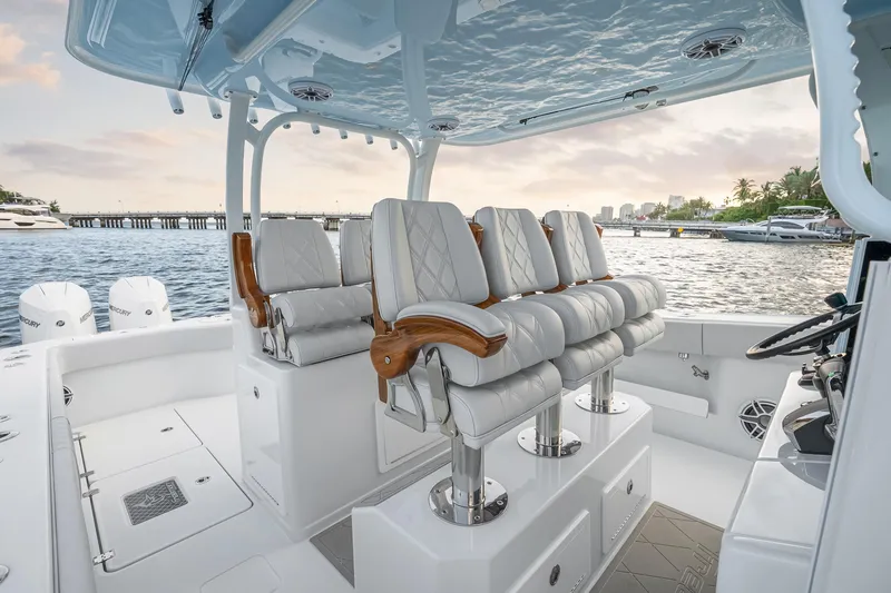 Slide: The Image of Luxurious 2026 Freeman 38 boat interior with plush seating, overlooking serene waterfront. - 50