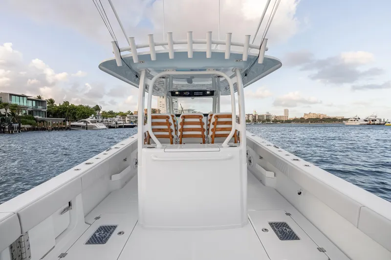 Slide: The Image of 2026 Freeman 38 boat on water, featuring sleek design and spacious deck. - 52