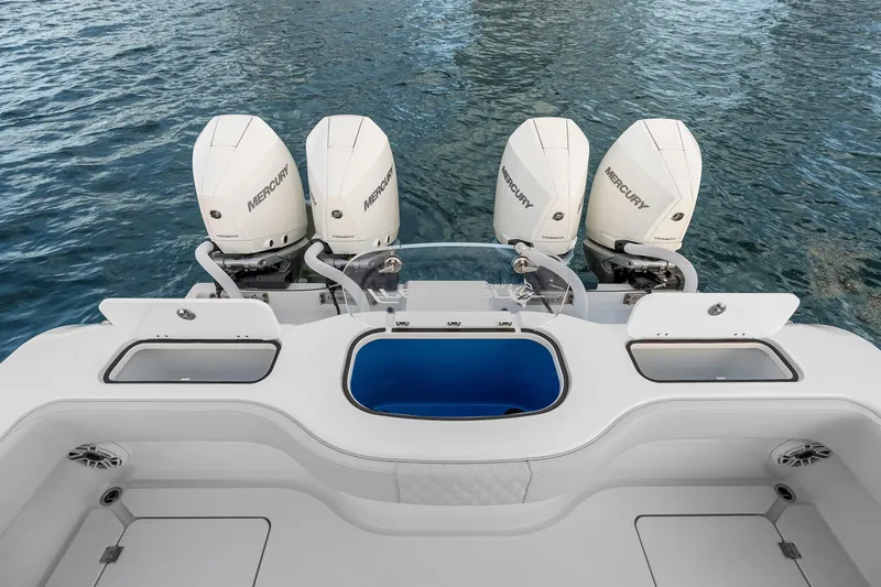 Slide: The Image of Freeman 38 boat with four Mercury engines, 2026 model, on water. - 66