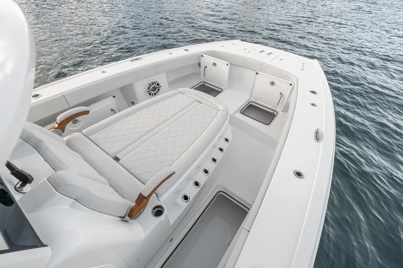 Slide: The Image of 2026 Freeman 38 boat interior with luxurious seating on calm water. - 67
