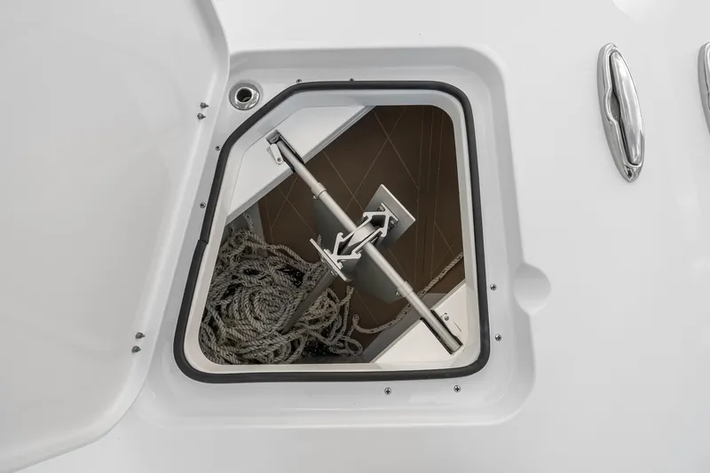 Slide: The Image of Anchor compartment of 2026 Freeman 38 boat with ropes and metal fittings. - 71